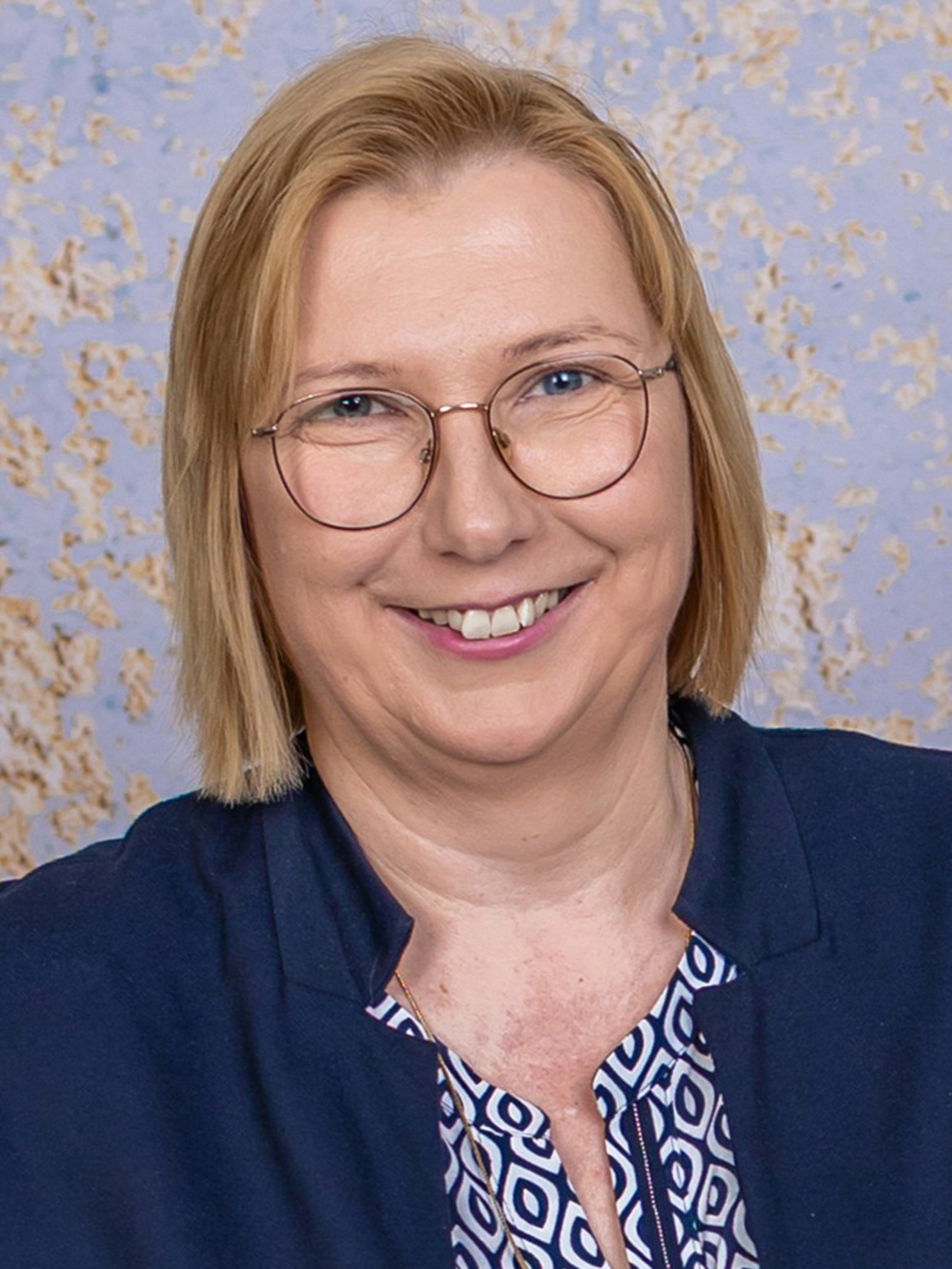 Das Bild zeigt eine Lehrperson